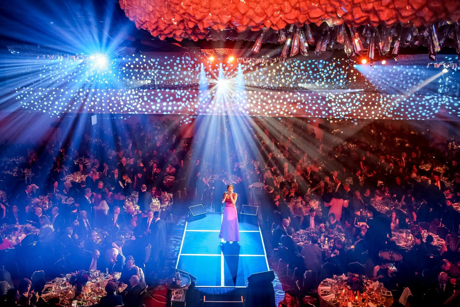 Strategic Stage Documentation Highlighting Leadership Presence during Business Gatherings